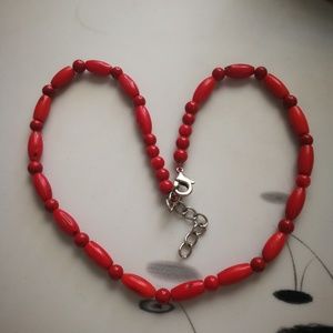 a coral beaded necklace